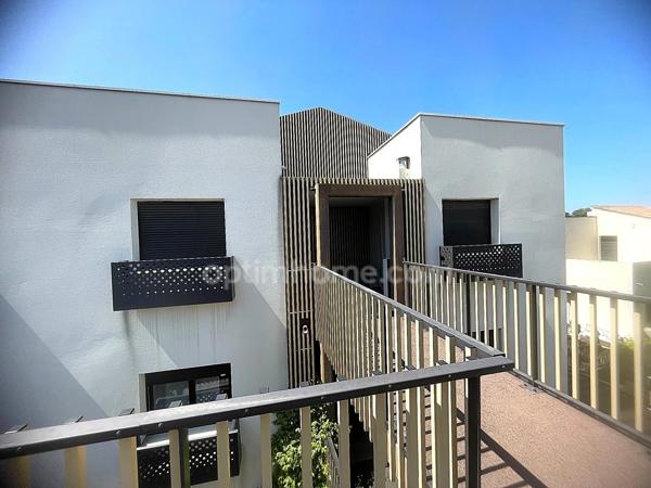 Appartement 3 pièces 83 m² - Dernier étage - Terrasse 18 m² - 2 Garages - Proche Ligne 2 Tram