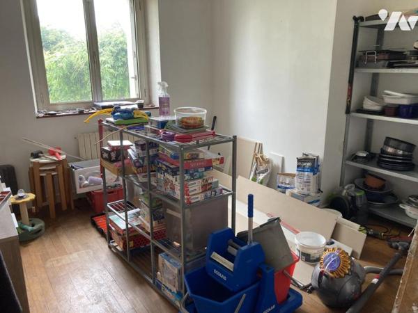 En centre ville maison traditionnelle sur terrain d'environ 1300 m²