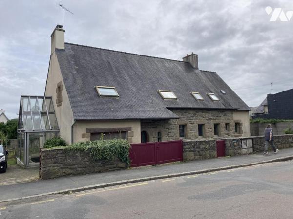 En centre ville maison traditionnelle sur terrain d'environ 1300 m²