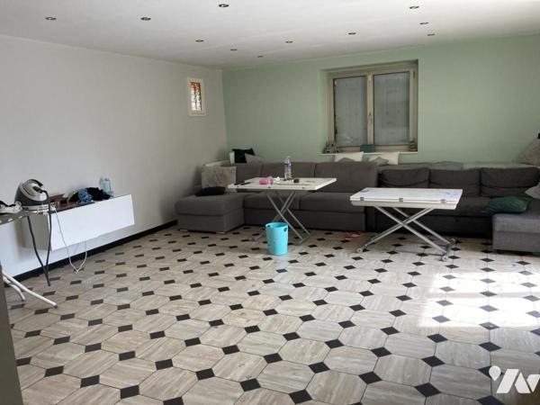 En centre ville maison traditionnelle sur terrain d'environ 1300 m²