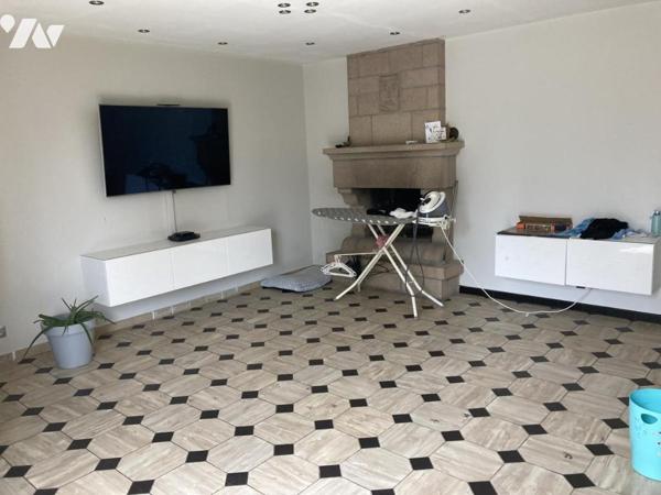 En centre ville maison traditionnelle sur terrain d'environ 1300 m²