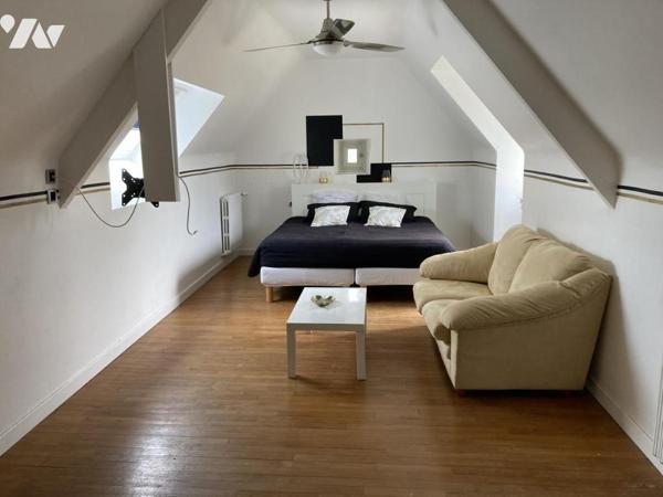 En centre ville maison traditionnelle sur terrain d'environ 1300 m²