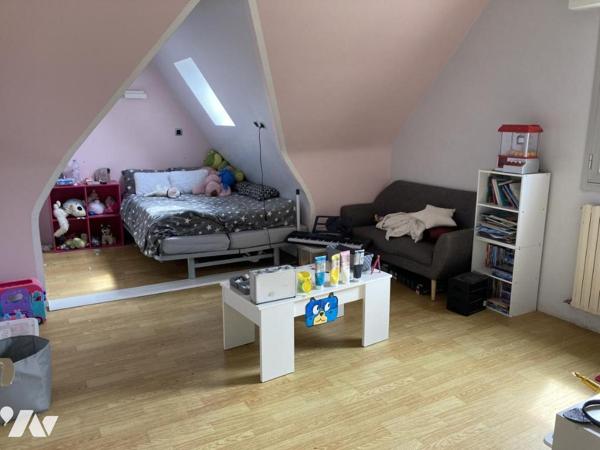 En centre ville maison traditionnelle sur terrain d'environ 1300 m²