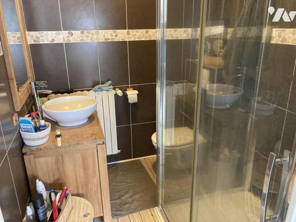 En centre ville maison traditionnelle sur terrain d'environ 1300 m²