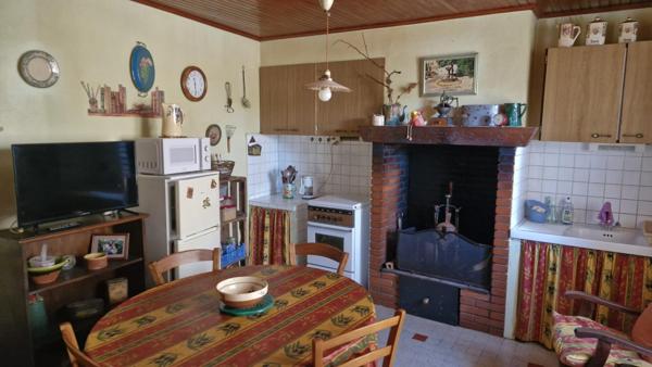Maison de village et terrain non attenant (1500m²)