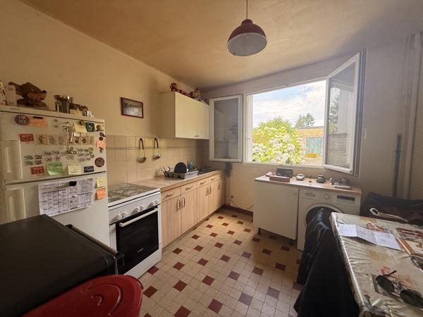 Maison de centre-ville avec jardin et garage – 64 m²