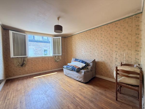 Maison de centre-ville avec jardin et garage – 64 m²