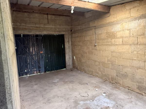 Maison de centre-ville avec jardin et garage – 64 m²