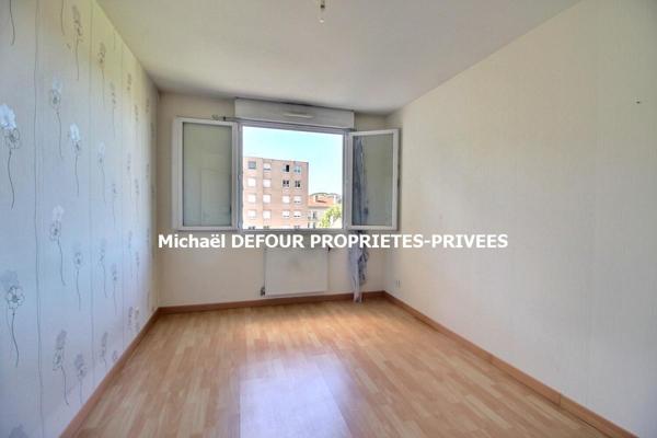 FIRMINY 42700 Appartement type T3 de 82 m² avec balcon, cave et place de parking