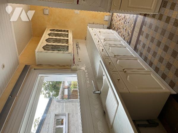 Commune de POIX DE PICARDIE, au centre bourg une maison