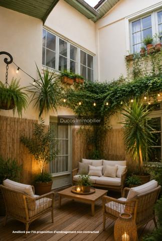Plein coeur de Sainte Bazeille maison avec patio, garage et beaux volumes
