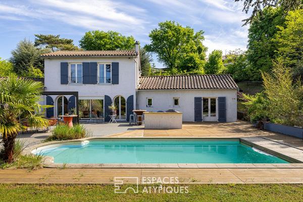 Maison avec vue dégagée, piscine et jardin arboré sur les hauteurs du 5ème