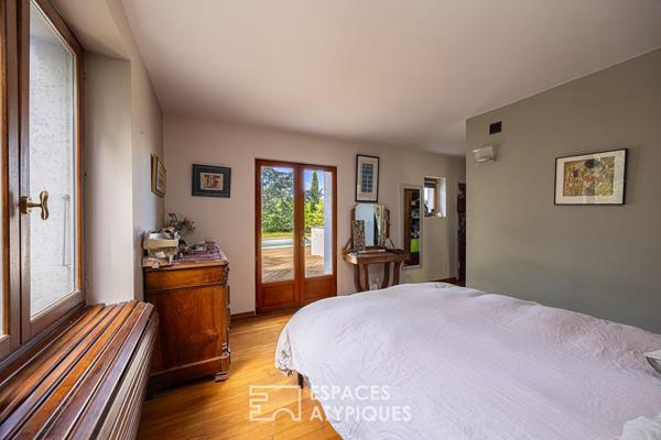 Maison avec vue dégagée, piscine et jardin arboré sur les hauteurs du 5ème