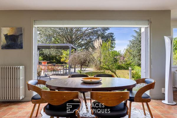 Maison avec vue dégagée, piscine et jardin arboré sur les hauteurs du 5ème