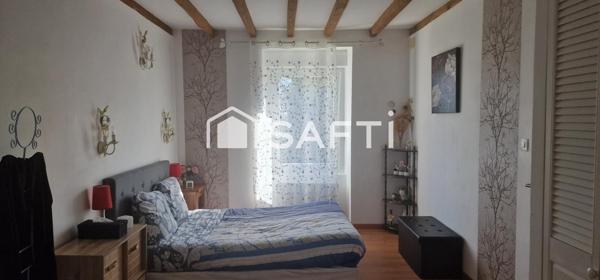 Maison mitoyenne en pierres