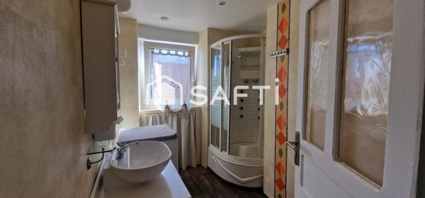 Maison mitoyenne en pierres