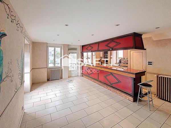 immeuble mixte commerce habitation