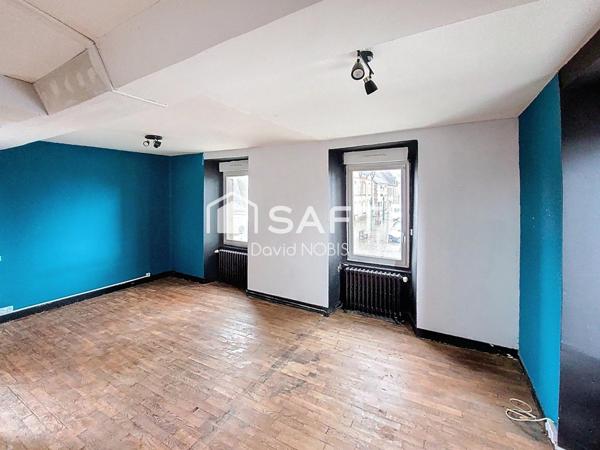 immeuble mixte commerce habitation