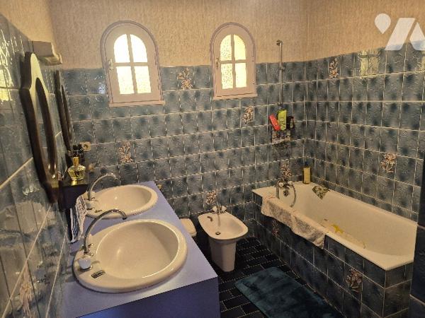 Pavillon sur sous sol avec 3 chambres