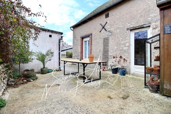 Maison de 5 pièces, 4 chambres avec garage et terrain