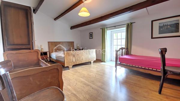 Très grande maison ancienne pleine de charme totalisant 190 m² habitables environ sur deux niveaux. Au rez de chaussée vous bénéficiez d'un espace nuit composé de deux chambres, une salle d'eau et wc indépendants que vous pouvez transformer en gite indépendant. L'accueil se présente par une très belle pièce à vivre  dotée d'une superbe cheminée ouverte et communiquante sur l'espace séjour et cuisine. Du salon on accède à la cuisine et à la buanderie d'un côté, et de l'autre côté à la terrasse plein sud, et à une autre chambre utilisée comme bureau orientée sud également. Puis l'escalier vous mène au second espace nuit composé de trois chambres, une pièce dressing et une salle d'eau. De l'extérieur et la terrasse vous pourrez profiter de la grande et belle nature avec vue sur des espaces dégagés, des arbres, du calme,  et vous rafraîchir dans la piscine chauffée par pompe à chaleur, entourée d'un très grand espace communiquant au séjoour cuisine et à un espace de stockage et rangements.
Pour tout renseignement complémentaire ou pour organiser une visite, contactez Dominique Ortion.
Tout candidat acquéreur est informé de son droit de se faire accompagner, lors de la visite, par un professionnel du bâtiment de son choix.
Il est demandé de signaler préalablement la présence de cet intervenant afin de permettre l’organisation de la visite dans des conditions adaptées.