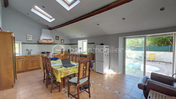 Très grande maison ancienne pleine de charme totalisant 190 m² habitables environ sur deux niveaux. Au rez de chaussée vous bénéficiez d'un espace nuit composé de deux chambres, une salle d'eau et wc indépendants que vous pouvez transformer en gite indépendant. L'accueil se présente par une très belle pièce à vivre  dotée d'une superbe cheminée ouverte et communiquante sur l'espace séjour et cuisine. Du salon on accède à la cuisine et à la buanderie d'un côté, et de l'autre côté à la terrasse plein sud, et à une autre chambre utilisée comme bureau orientée sud également. Puis l'escalier vous mène au second espace nuit composé de trois chambres, une pièce dressing et une salle d'eau. De l'extérieur et la terrasse vous pourrez profiter de la grande et belle nature avec vue sur des espaces dégagés, des arbres, du calme,  et vous rafraîchir dans la piscine chauffée par pompe à chaleur, entourée d'un très grand espace communiquant au séjoour cuisine et à un espace de stockage et rangements.
Pour tout renseignement complémentaire ou pour organiser une visite, contactez Dominique Ortion.
Tout candidat acquéreur est informé de son droit de se faire accompagner, lors de la visite, par un professionnel du bâtiment de son choix.
Il est demandé de signaler préalablement la présence de cet intervenant afin de permettre l’organisation de la visite dans des conditions adaptées.