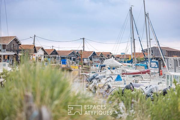 Esprit Cabane ostréicole avec vue panoramique sur le port de Gujan