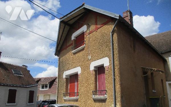 Maison en centre-ville, sur rue calme