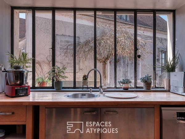 Maison de caractère en coeur de ville avec jardin et revenus locatifs