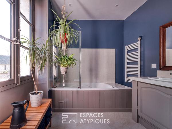 Maison de caractère en coeur de ville avec jardin et revenus locatifs