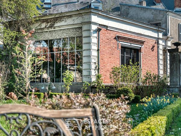 Maison de caractère en coeur de ville avec jardin et revenus locatifs