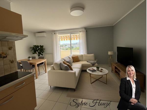 Appartement de type 3 avec terrasse et une place de parking
