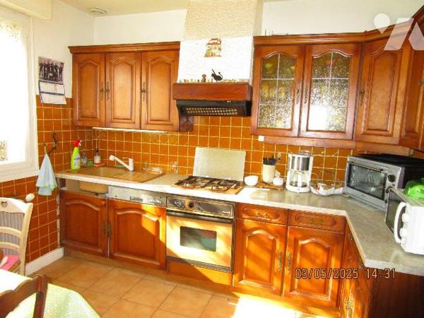 Maison d'habitation construite en 1963, composée de : 
- Au rez-de-chaussée : cuisine d'été, 1...