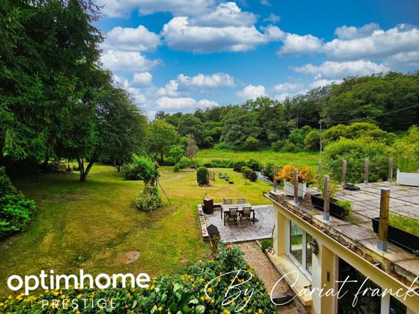 ANCIEN MOULIN DE 160 M², L’ENSEMBLE SUR SON PARC 3755 M² DE TERRAIN CLOS :