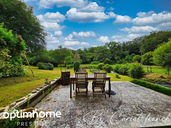 ANCIEN MOULIN DE 160 M², L’ENSEMBLE SUR SON PARC 3755 M² DE TERRAIN CLOS :