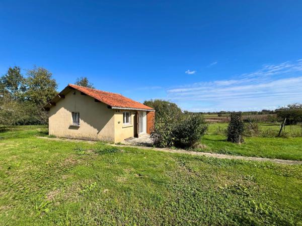 Maison Proche commodités avec garnd terrain , studio et garage