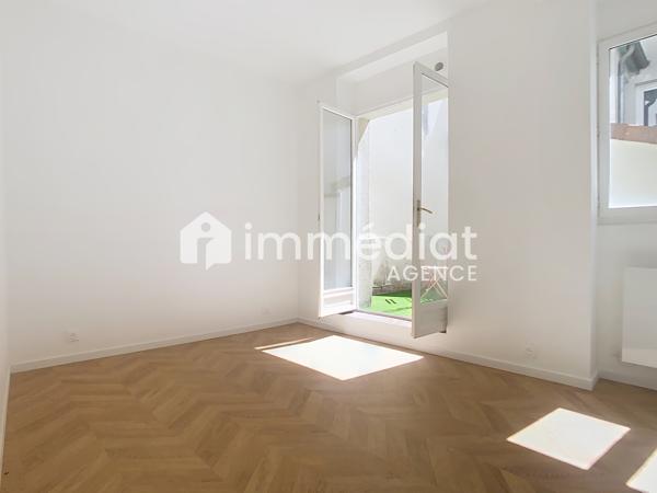 Deux pièces, terrasse 25m², centre-ville
