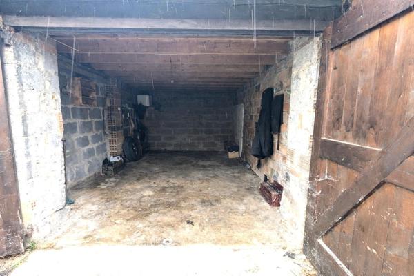 Terrain avec Garage et dependance