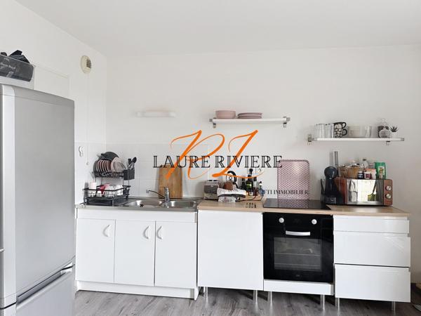 Appartement T3 de 64 m² avec superbe balcon terrasse, dans un cadre verdoyant et paisible