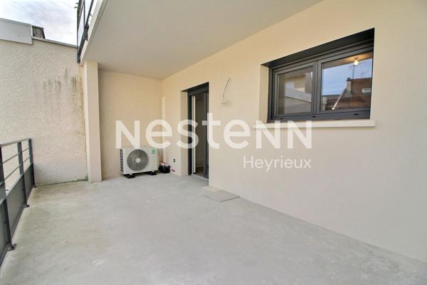 Centre Heyrieux: Appartement de type 3 , terrasse, stationnement et cave
