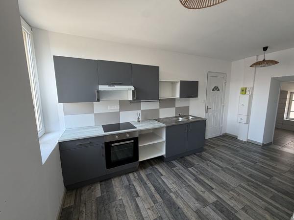 Appartement F3 - MONTROND LES BAINS