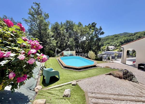 Villa de type 5 de 127 m2 habitables avec quatre chambres, jardin avec vue dominante.