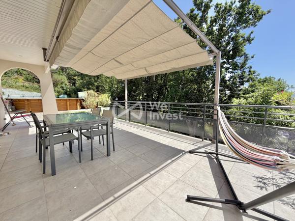 Villa de type 5 de 127 m2 habitables avec quatre chambres, jardin avec vue dominante.