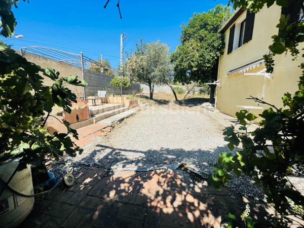 MAISON T4 AVEC GARDIN ET GARAGE