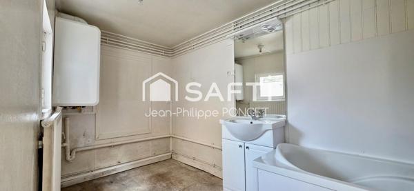 Maison beau potentiel proche du centre ville avec jardin