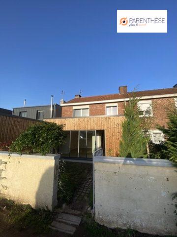 Maison semi individuelle / garage et jardin sud ouest