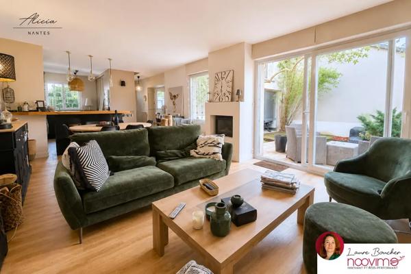 Maison familiale de 120 m2 avec 4 chambres, jardin et garage