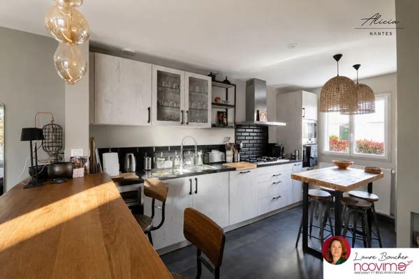 Maison familiale de 120 m2 avec 4 chambres, jardin et garage