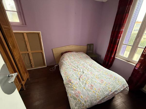 Ensemble immobilier avec 4 appartements surface au sol 196m²- Parcelle de 401 m²