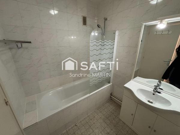 Appartement T3, 63m2, 2 caves, stationnement gratuit